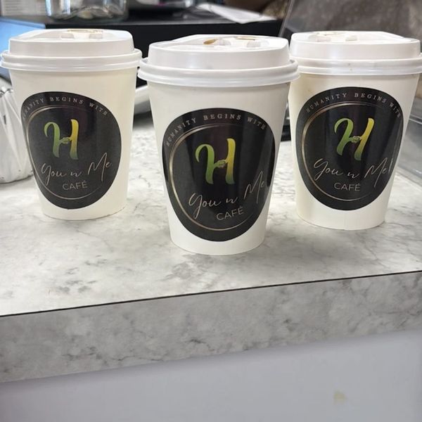 You N Me' Café takeaway cups, ready to deliver